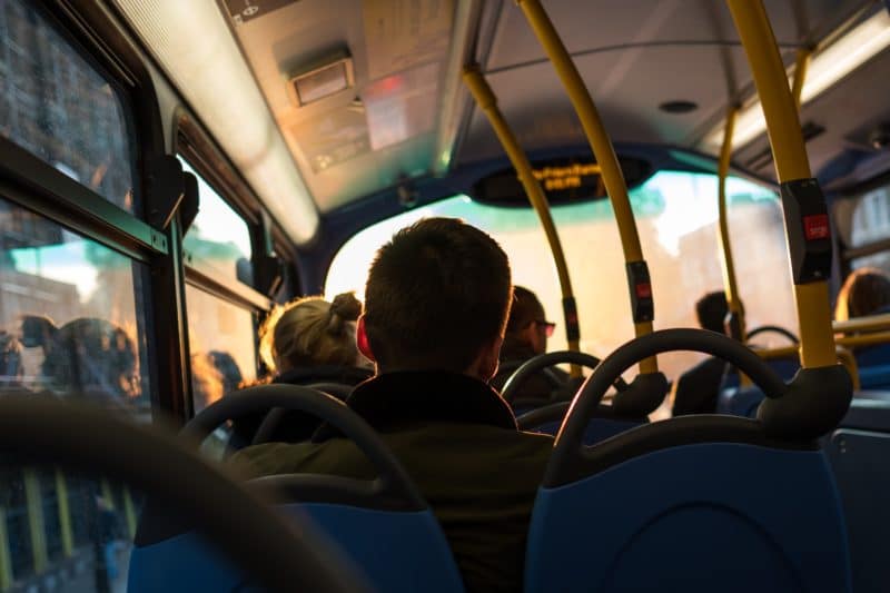 Man sitting on a bus